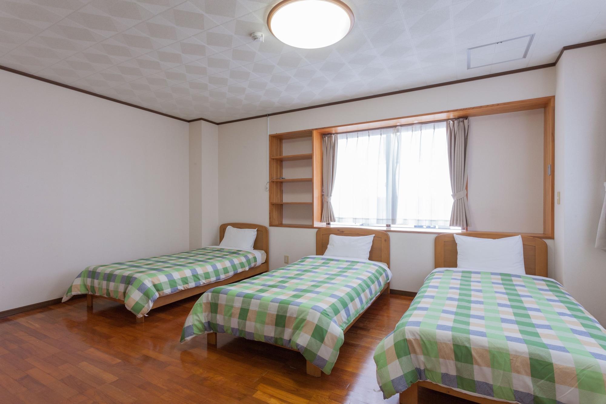 Kariyushi Condominium Resort Sea Side House Наґо Екстер'єр фото