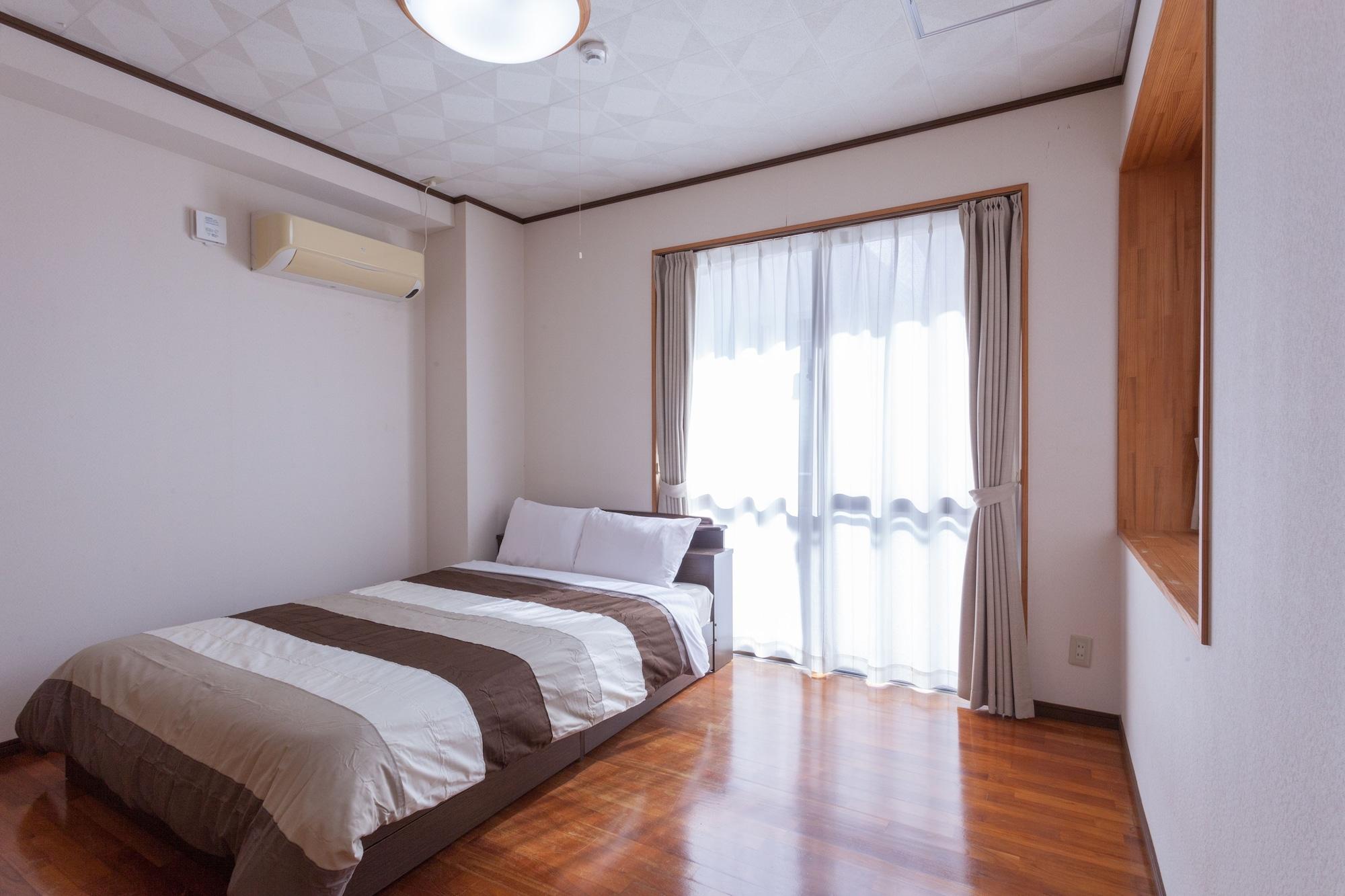 Kariyushi Condominium Resort Sea Side House Наґо Екстер'єр фото
