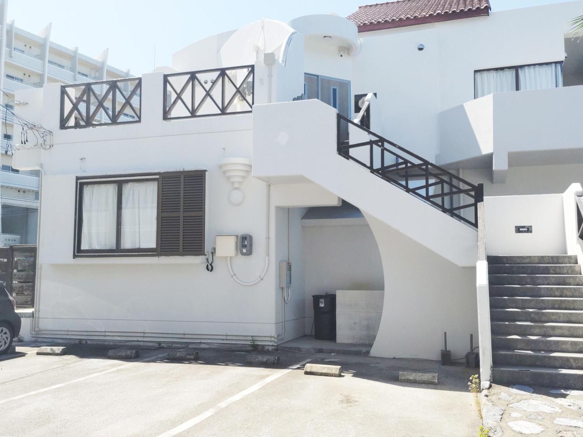 Kariyushi Condominium Resort Sea Side House Наґо Екстер'єр фото