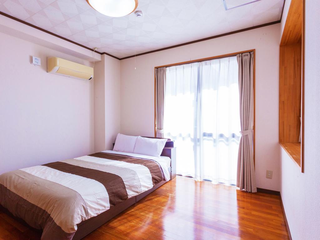 Kariyushi Condominium Resort Sea Side House Наґо Екстер'єр фото